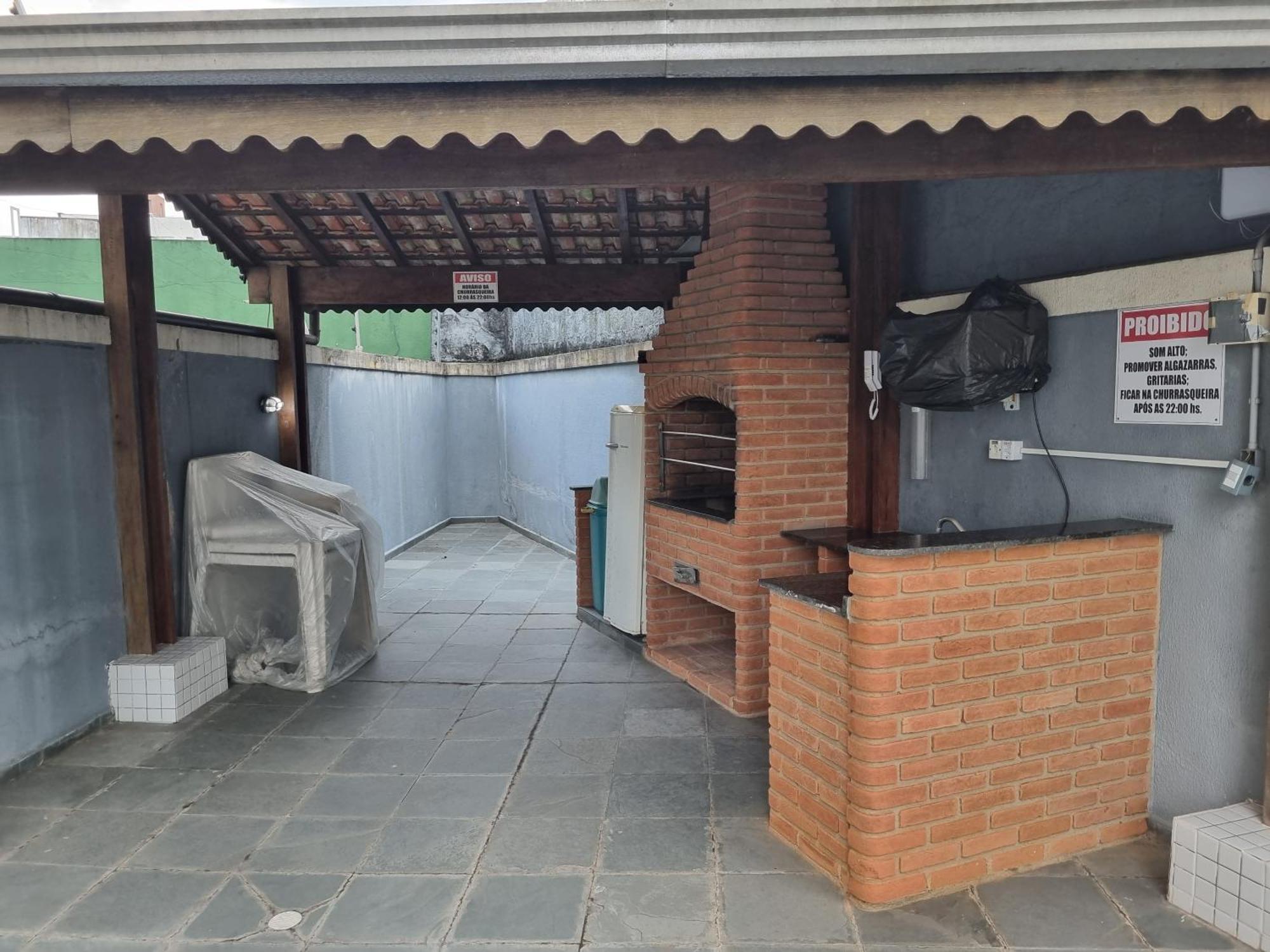 Apartamento Praia Da Enseada Гуаружа Екстериор снимка